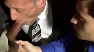 Nude unshaven scantling sucking two cocks in an orgy